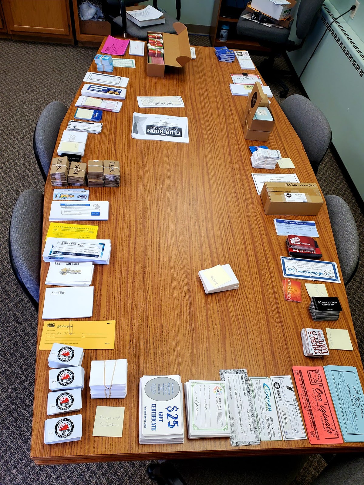 Picture of all the gift cards - totalling more than $65,000 - prior to mailing out to consumers.
